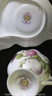 Porcelain Bone China Teacup and Toast Snack Plate in Dundee Thistle pattern made by Queen Anne in England.