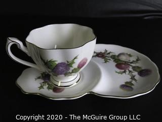 Porcelain Bone China Teacup and Toast Snack Plate in Dundee Thistle pattern made by Queen Anne in England.