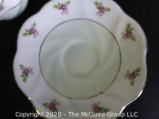 Porcelain Bone China Teacup and Saucer made by Queens in England.