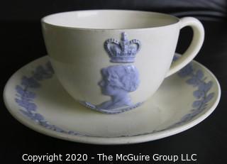 Porcelain Bone China Teacup and Saucer in Queens Ware pattern made by Wedgwood Etruria, England.