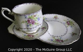 Porcelain Bone China Teacup and Toast Snack Plate in Petit Point China pattern made by Royal Albert in England.