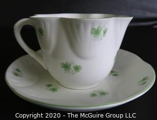 Porcelain Bone China Teacup and Saucer made in Shamrock pattern made by Crown Staffordshire in England.