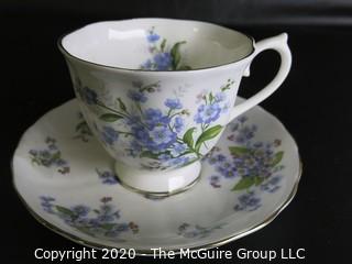 Porcelain Bone China Teacup and Saucer made in Forget Me Not pattern made by Tuscan Fine China in England.