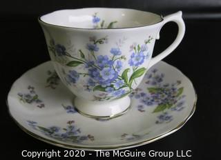 Porcelain Bone China Teacup and Saucer made in Forget Me Not pattern made by Tuscan Fine China in England.