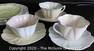 Lot #0105: Set of 10 Porcelain Bone China Pieces.  Includes Teacups with Saucers, Three Lunch Plates and One Extra Saucer in Coordinating Colors made by Shelley in England.
