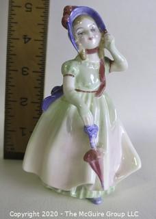 Vintage Royal Doulton Porcelain Figurine "Babie". Measures approximately 5" tall. 