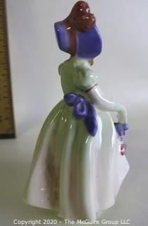 Vintage Royal Doulton Porcelain Figurine "Babie". Measures approximately 5" tall. 