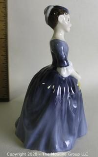 Vintage Royal Doulton Porcelain Figurine "Cherie". Measures approximately 6" tall. 