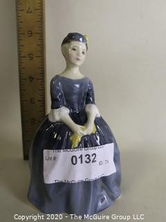 Vintage Royal Doulton Porcelain Figurine "Cherie". Measures approximately 6" tall. 