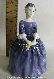 Vintage Royal Doulton Porcelain Figurine "Cherie". Measures approximately 6" tall. 