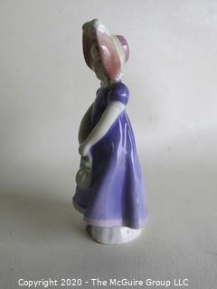 Vintage Royal Doulton Porcelain Figurine "Ivy". Measures approximately 5 1/2" tall.