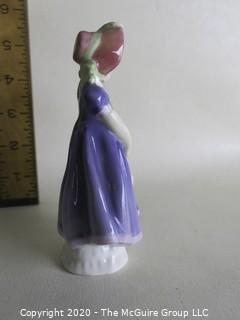 Vintage Royal Doulton Porcelain Figurine "Ivy". Measures approximately 5 1/2" tall.