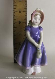 Vintage Royal Doulton Porcelain Figurine "Ivy". Measures approximately 5 1/2" tall.