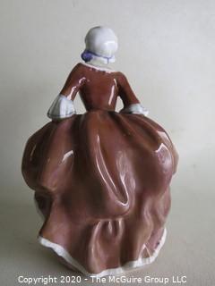 Vintage Royal Doulton Porcelain Figurine "Goody Two Shoes". Measures approximately 6" tall.