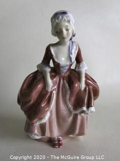 Vintage Royal Doulton Porcelain Figurine "Goody Two Shoes". Measures approximately 6" tall.