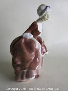 Vintage Royal Doulton Porcelain Figurine "Goody Two Shoes". Measures approximately 6" tall.