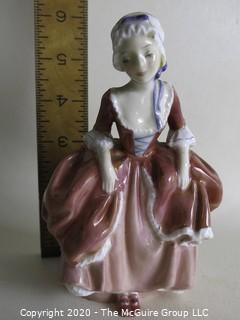 Vintage Royal Doulton Porcelain Figurine "Goody Two Shoes". Measures approximately 6" tall.