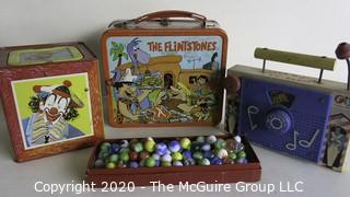 Four Vintage Children's Items.  Includes Box of Marbles, Lunch Box, Jack in the Box and Fisher Price Music Box. 