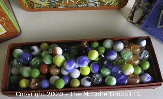 Four Vintage Children's Items.  Includes Box of Marbles, Lunch Box, Jack in the Box and Fisher Price Music Box. 