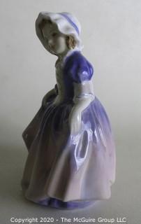 Vintage Royal Doulton Porcelain Figurine "Dinky Do". Measures approximately 5" tall.