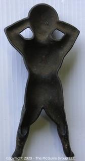 Vintage Naughty Nellie Cast Iron Boot Jack.  Measures approximately 11" long. 