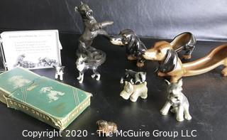 Collection of Dog Figurines of Various Materials and Playing Cards.