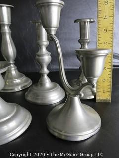 Group of 11 Pewter Candle Sticks.  Makers Include Wpodbury Pewter and Crown & Rose Cast Pewter from England.  