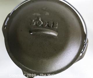 Lodge Heavy Cast Iron Pot with Lid and Handle.  New with Label inside. Measures approximately 5" x 11".