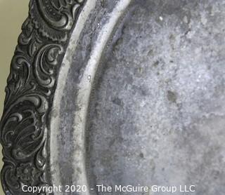 Round Pewter Tray with Floral Relief Edge.  Measures approximately 12".