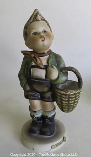 Group of Seven Hummel Figurines. 