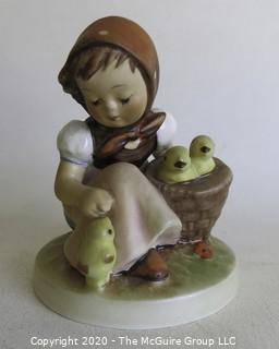 Group of Seven Hummel Figurines. 