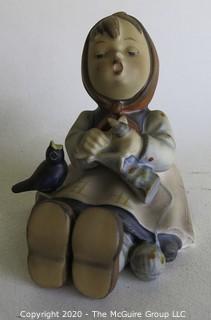 Group of Seven Hummel Figurines. 