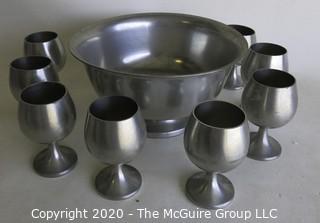 Pewter Punch Bowl and Eight Stemmed Cups made by Stieff and Preisner.  Bowl measures approximately 9" in diameter and cups measure approximately 4" tall.