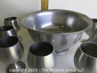 Pewter Punch Bowl and Eight Stemmed Cups made by Stieff and Preisner.  Bowl measures approximately 9" in diameter and cups measure approximately 4" tall.