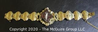 Antique 14Kt Gold Link (unmarked, but tested) Bracelet with Garnet and Pearl Flower Center.  Measures approximately 6" long; total weight 18 grams. (Description altered 03.19 @ 4:29pm ET)