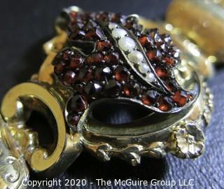 Antique 14Kt Gold Link (unmarked, but tested) Bracelet with Garnet and Pearl Flower Center.  Measures approximately 6" long; total weight 18 grams. (Description altered 03.19 @ 4:29pm ET)