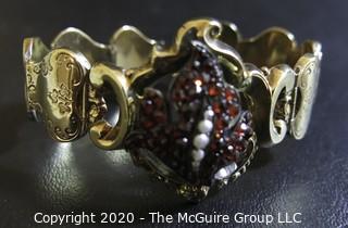 Antique 14Kt Gold Link (unmarked, but tested) Bracelet with Garnet and Pearl Flower Center.  Measures approximately 6" long; total weight 18 grams. (Description altered 03.19 @ 4:29pm ET)