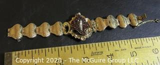 Antique 14Kt Gold Link (unmarked, but tested) Bracelet with Garnet and Pearl Flower Center.  Measures approximately 6" long; total weight 18 grams. (Description altered 03.19 @ 4:29pm ET)