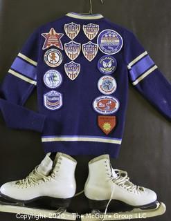 Vintage Sweater Covered with United States Figure Skating Association Patches. Size Small. photos are shown of the young skater performing; however, the photos and skates are not part of the grouping). 