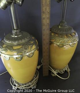 Pair of Yellow Ceramic Asian Inspired Table Lamps with Brass Accents.  Base Measures Approximately 18" tall. 