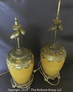 Pair of Yellow Ceramic Asian Inspired Table Lamps with Brass Accents.  Base Measures Approximately 18" tall. 