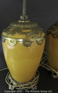 Pair of Yellow Ceramic Asian Inspired Table Lamps with Brass Accents.  Base Measures Approximately 18" tall. 