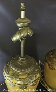 Pair of Yellow Ceramic Asian Inspired Table Lamps with Brass Accents.  Base Measures Approximately 18" tall. 