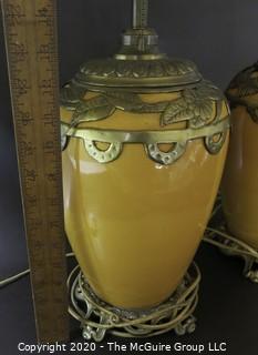 Pair of Yellow Ceramic Asian Inspired Table Lamps with Brass Accents.  Base Measures Approximately 18" tall. 