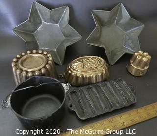 Group of Seven Baking Molds and Cast Iron Cooking Pieces. 