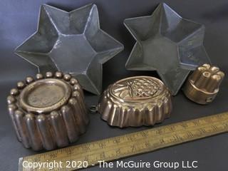 Group of Seven Baking Molds and Cast Iron Cooking Pieces. 