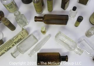 Collection of Antique Medical Bottles, Many with Labels.