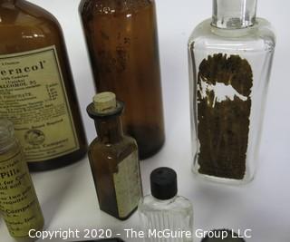 Collection of Antique Medical Bottles, Many with Labels.