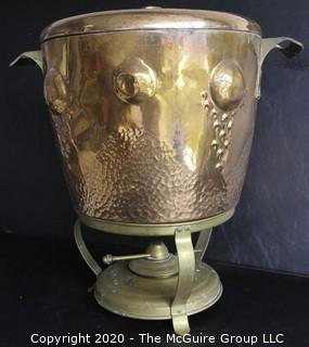 Antique Large Hammered Copper Lidded Pot with Brass Warming Stand.  Lid has inscription written in German dated 1908.  Measures approximately 10" with Stand.