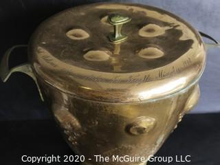 Antique Large Hammered Copper Lidded Pot with Brass Warming Stand.  Lid has inscription written in German dated 1908.  Measures approximately 10" with Stand.